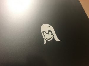 Company logo engraving on laptop